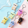 New cute yu cartoon doll aviator keychain creative color spaceman male and female couple bag pendant